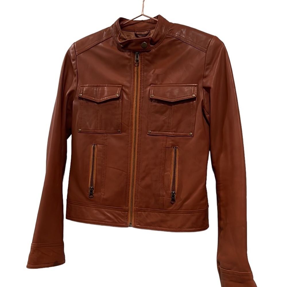 Women’s United Face Caramel brown leather jacket. Size XS